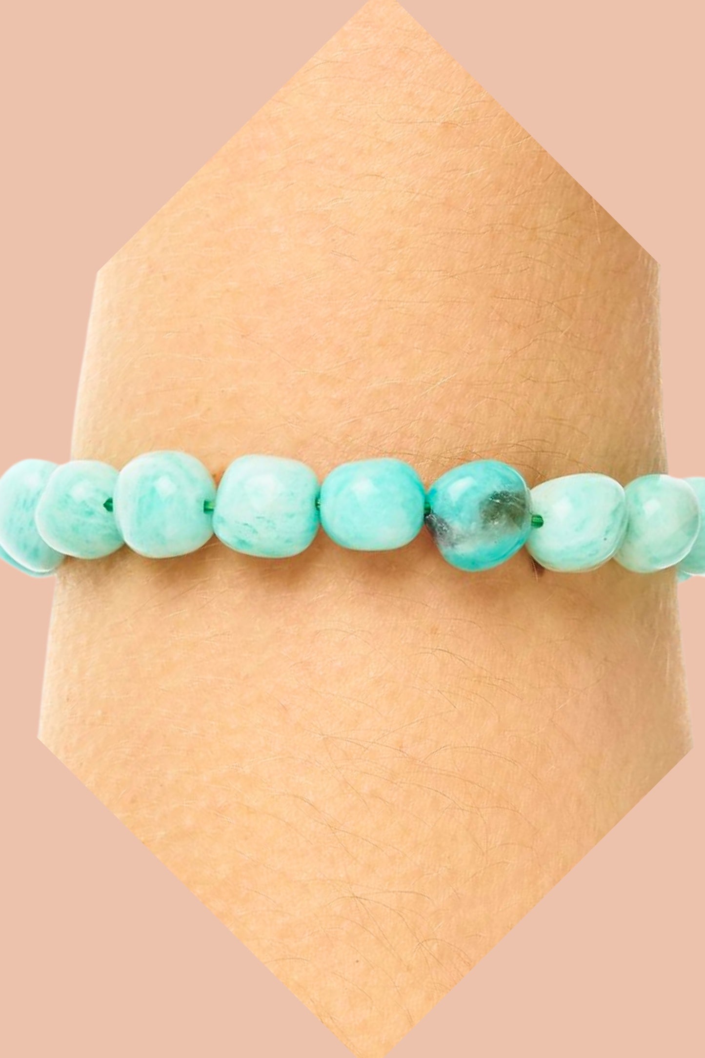 Natural Green Amazonite crystal bracelet with genuine 8-10mm tumblestone beads by Meraki Beach. Traditionally associated with courage, authenticity, growth and positive energy. Includes free crystal guide and jute hessian gift pouch.