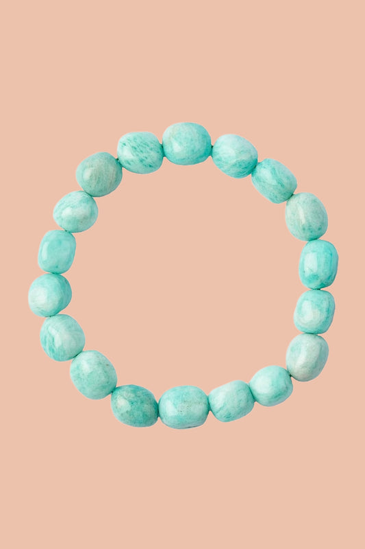 Natural Green Amazonite crystal bracelet with genuine 8-10mm tumblestone beads. Traditionally associated with courage, authenticity, growth and positive energy. Includes free crystal guide and jute hessian gift pouch.