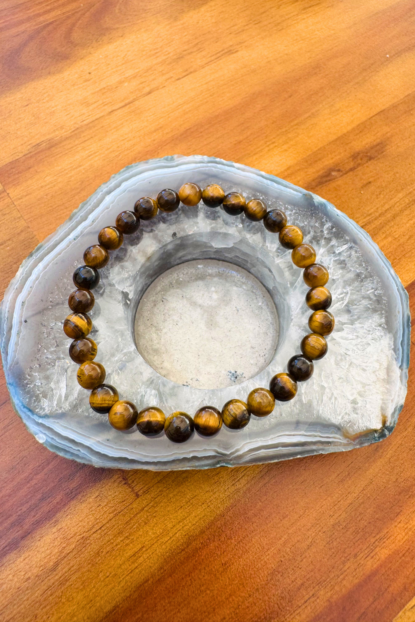 Tiger's Eye Crystal Bracelet with Free Crystal Guide and Cotton Storage Bag by Meraki Rituals Crystal Collection.