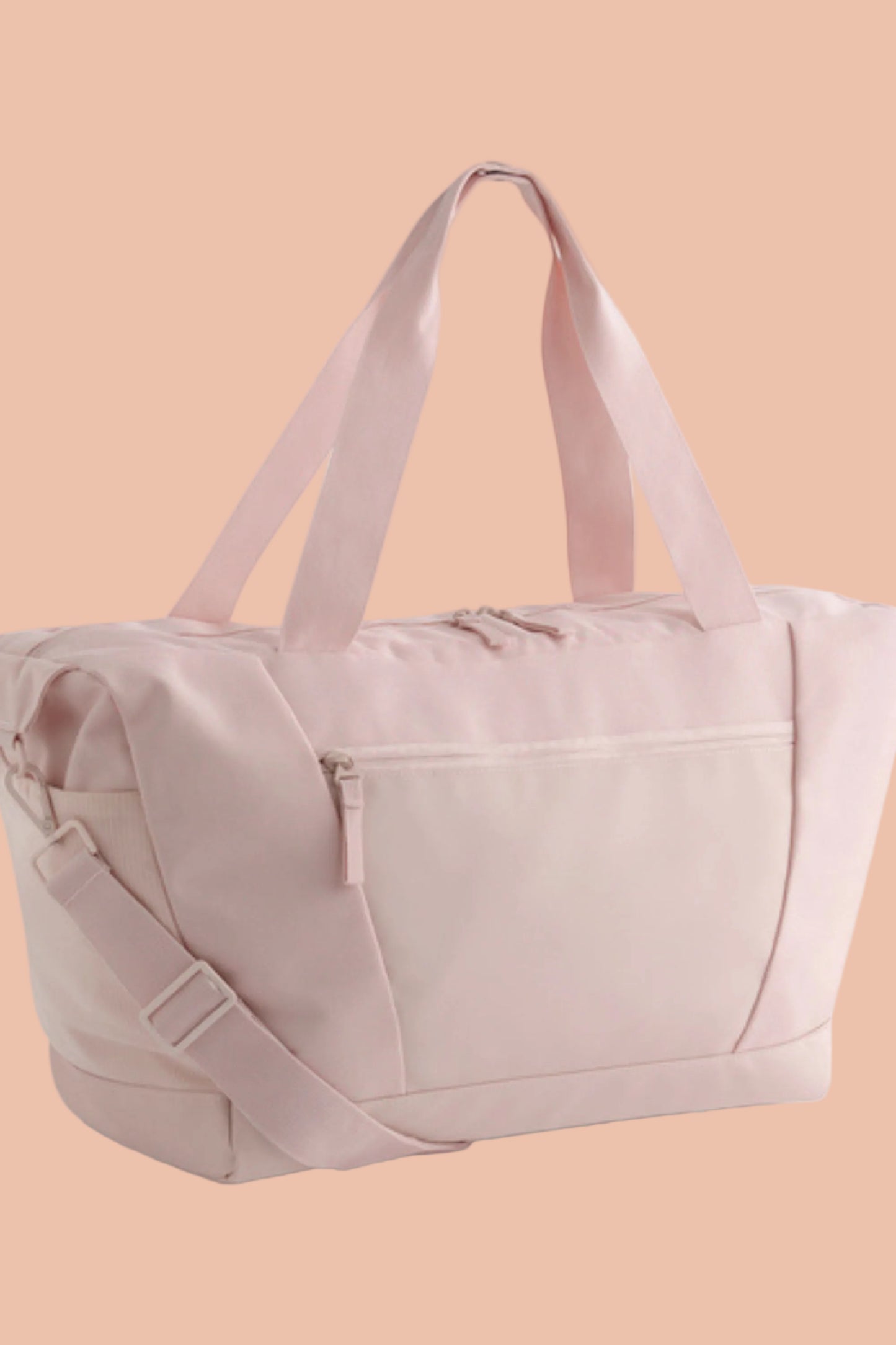 Pink VITA Sustainable fitness, tennis, padel and travel bag with shoulder strap and zip pockets by Meraki Beach.