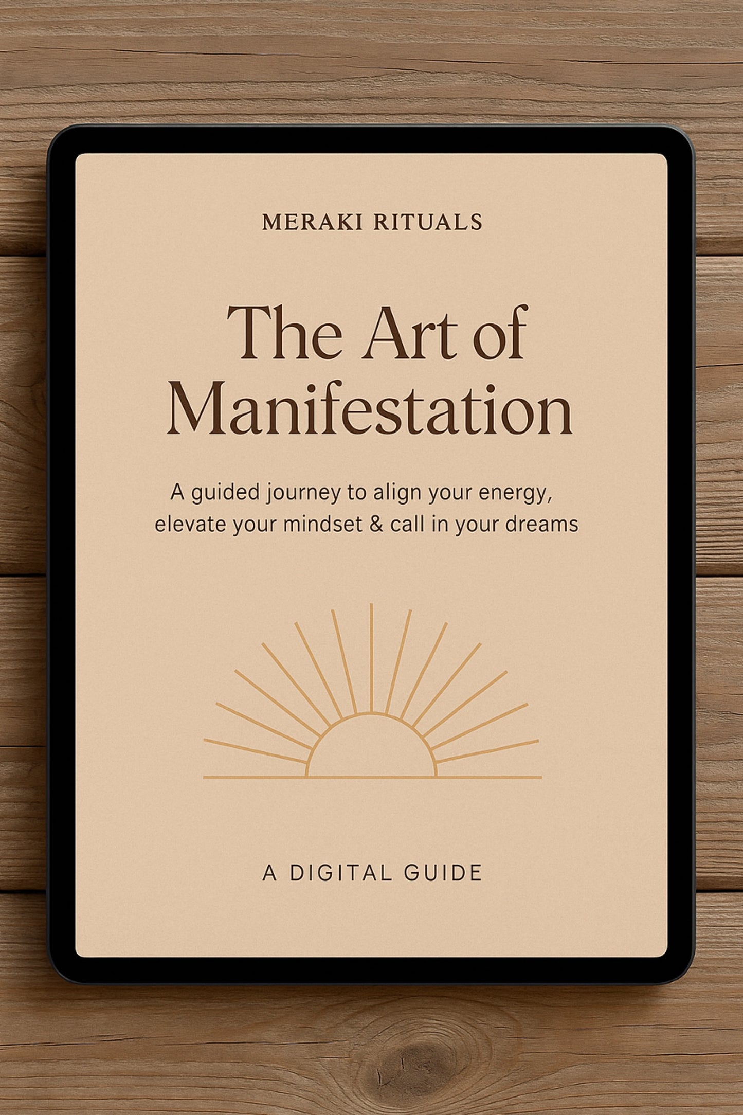 Digital guide titled 'The Art of Manifestation' by Meraki Rituals on a wooden surface