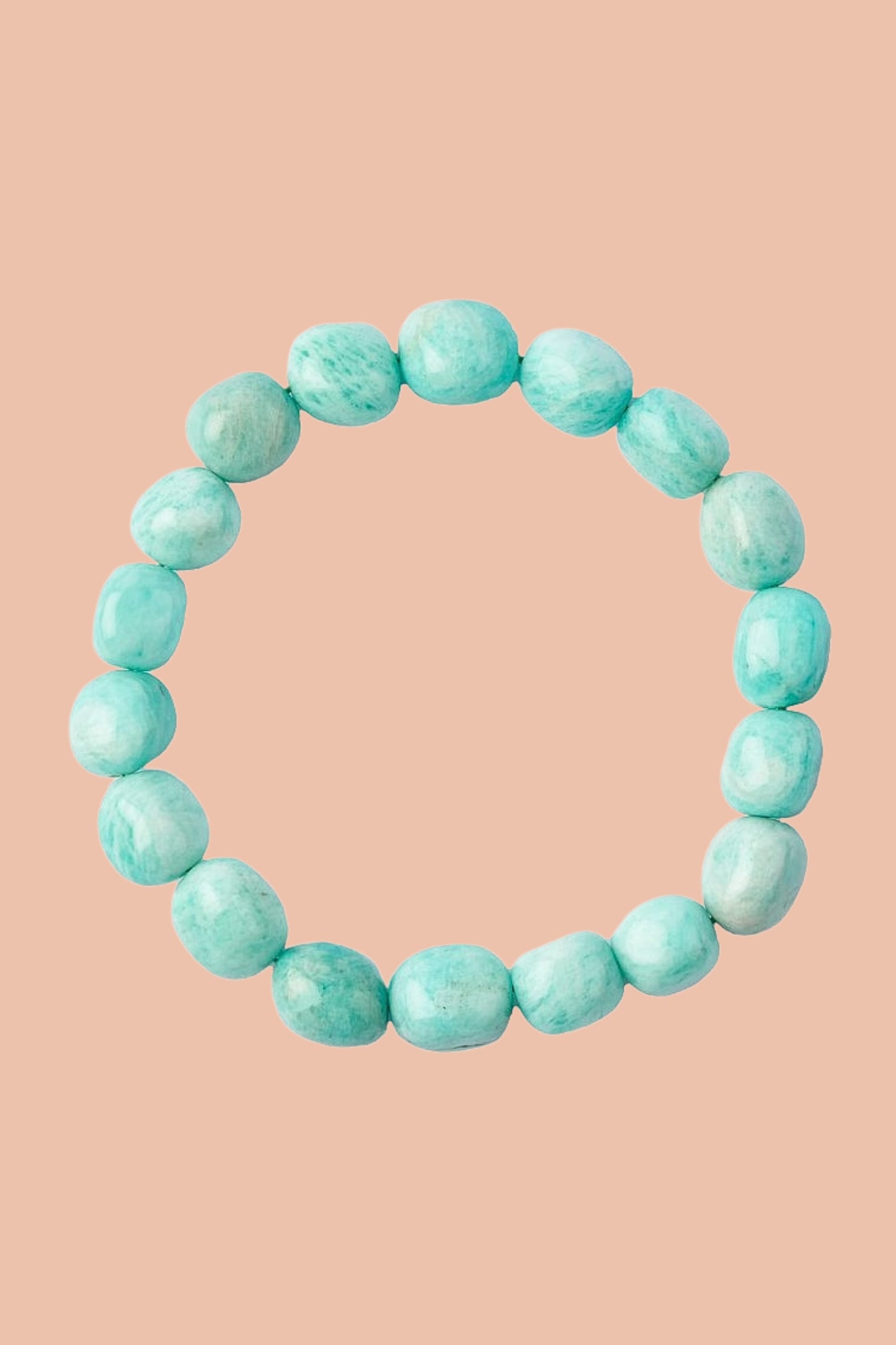 Natural Green Amazonite crystal bracelet with genuine 8-10mm tumblestone beads. Traditionally associated with courage, authenticity, growth and positive energy. Includes free crystal guide and jute hessian gift pouch.