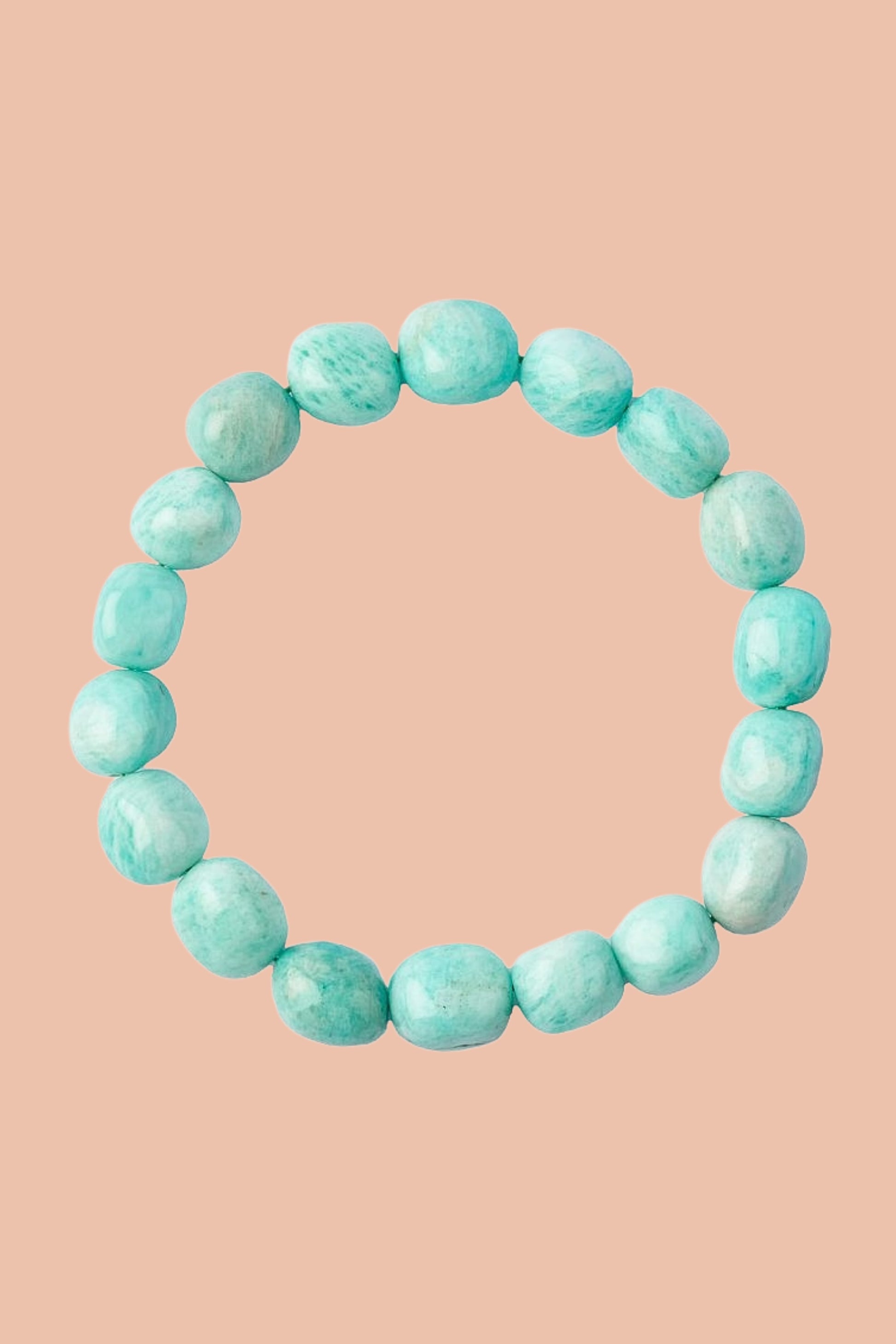 Natural Green Amazonite crystal bracelet with genuine 8-10mm tumblestone beads. Traditionally associated with courage, authenticity, growth and positive energy. Includes free crystal guide and jute hessian gift pouch.