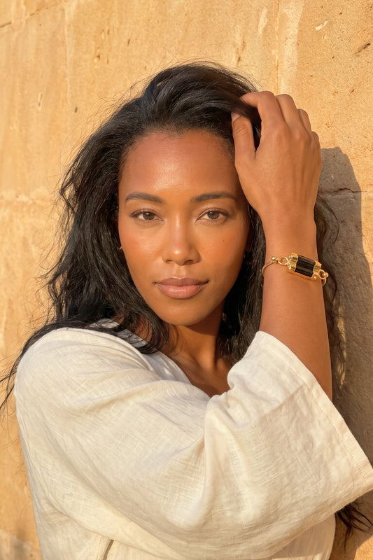 Gold-plated Black tourmaline crystal bangle by Meraki Beach - Wear Your Energy Crystal Collection.