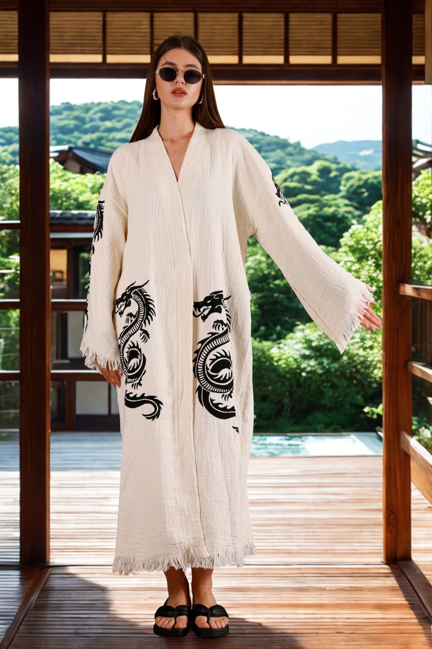 Meraki Beach HAKU Kimono in organic cotton cream, hand block printed with black Japanese dragon design – sustainable, ethical resort wear for women.
