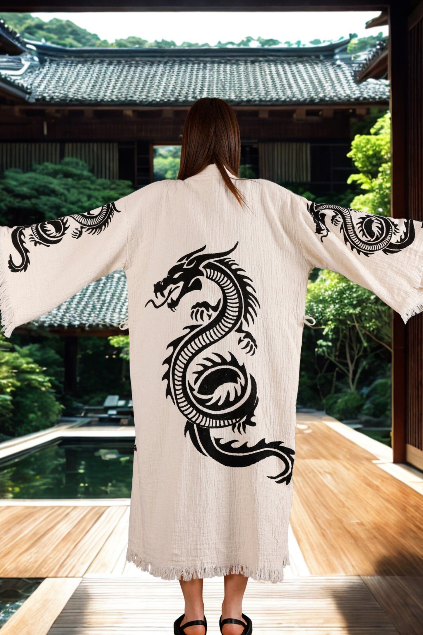 Meraki Beach HAKU Kimono in organic cotton cream, hand block printed with black Japanese dragon design – sustainable, ethical resort wear for women.