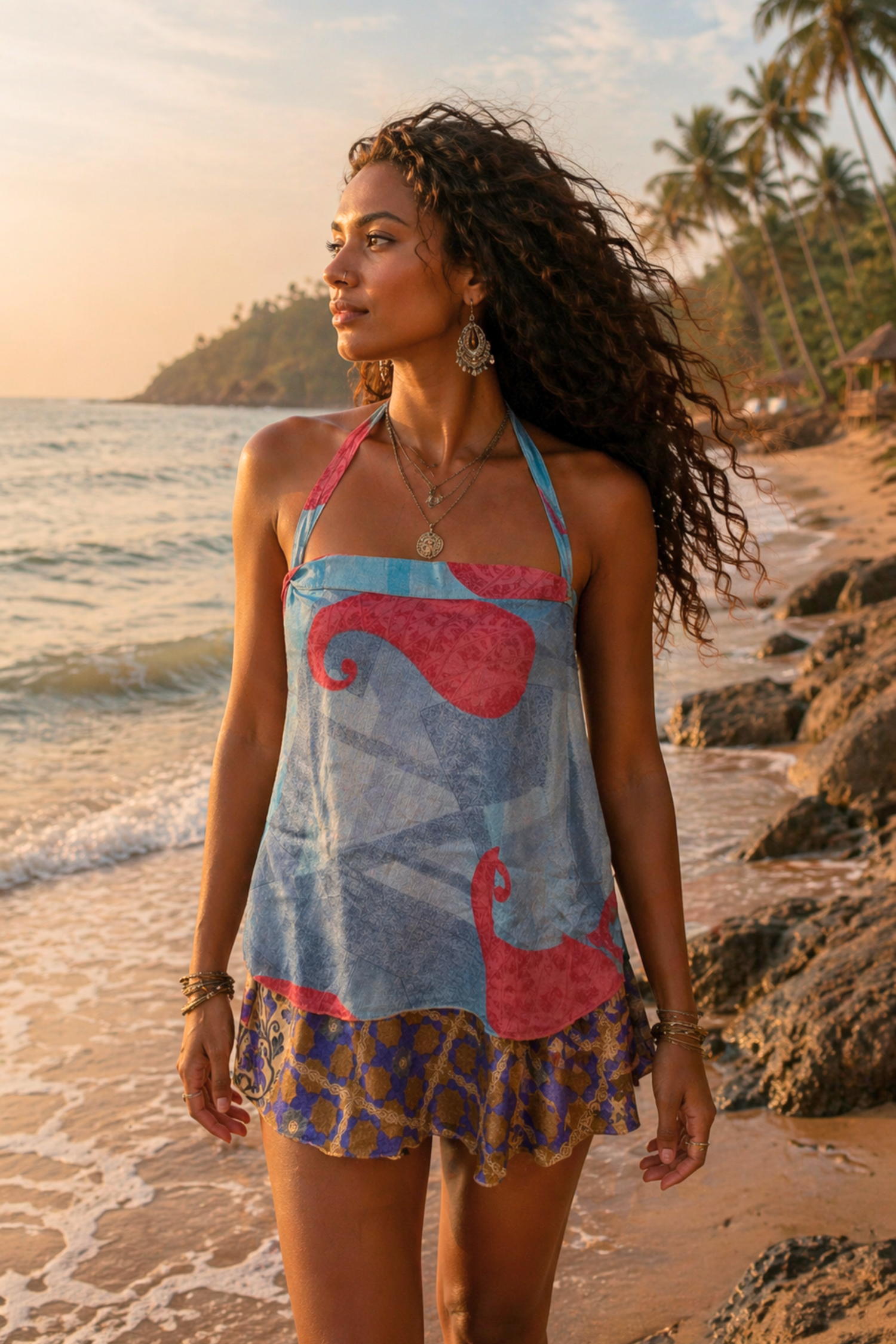 Eco-friendly silk mini dress with layered boho design by Meraki Beach. 