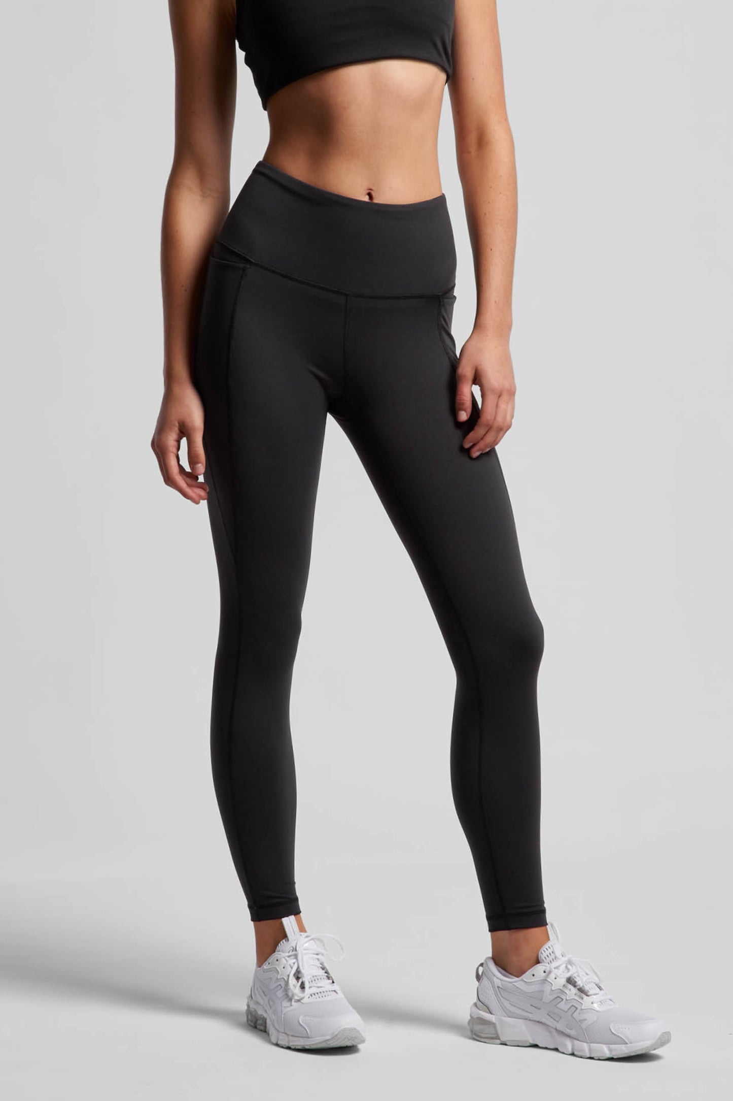 Model wearing MAREA Recycled Nylon Leggings in Black by Meraki Beach – sustainable high-waist activewear leggings made from ocean plastics