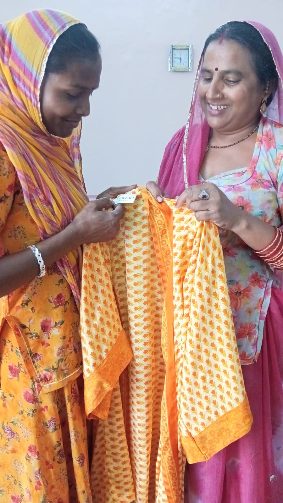 THE SAHELI WOMEN OF RURAL RAJASTHAN WORKING ON THE MERAKI BEACH SOLARA SILK COLLECTION. VINTAGE SILK SARI KIMONOS.