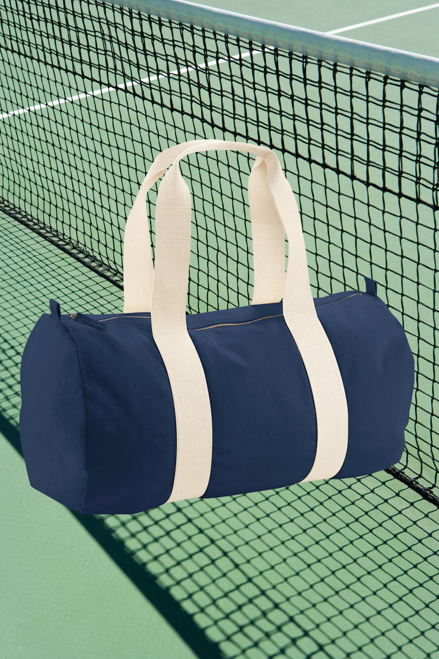 Meraki Beach organic cotton SOL duffel bag in navy with cream straps. 