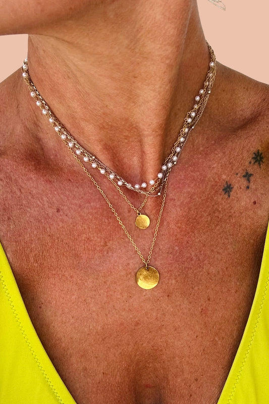 THALASSA PEARL AND GOLD COIN LAYERING NECKLACE BY MERAKI BEACH.
