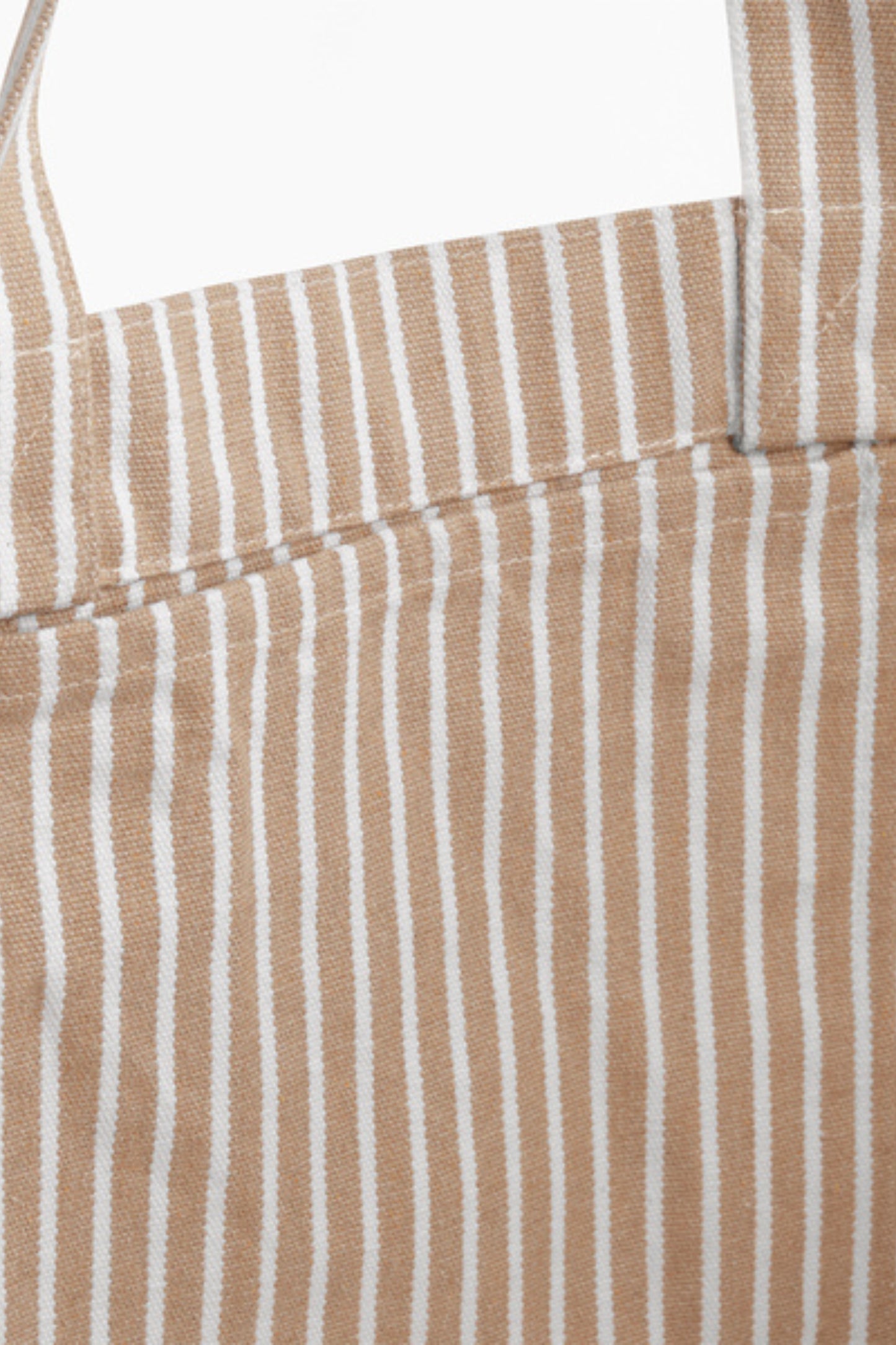 Close up of the NOLA sustainable Oversized Beach Bag , showing internal pocket in striped Biscuit by Meraki Beach