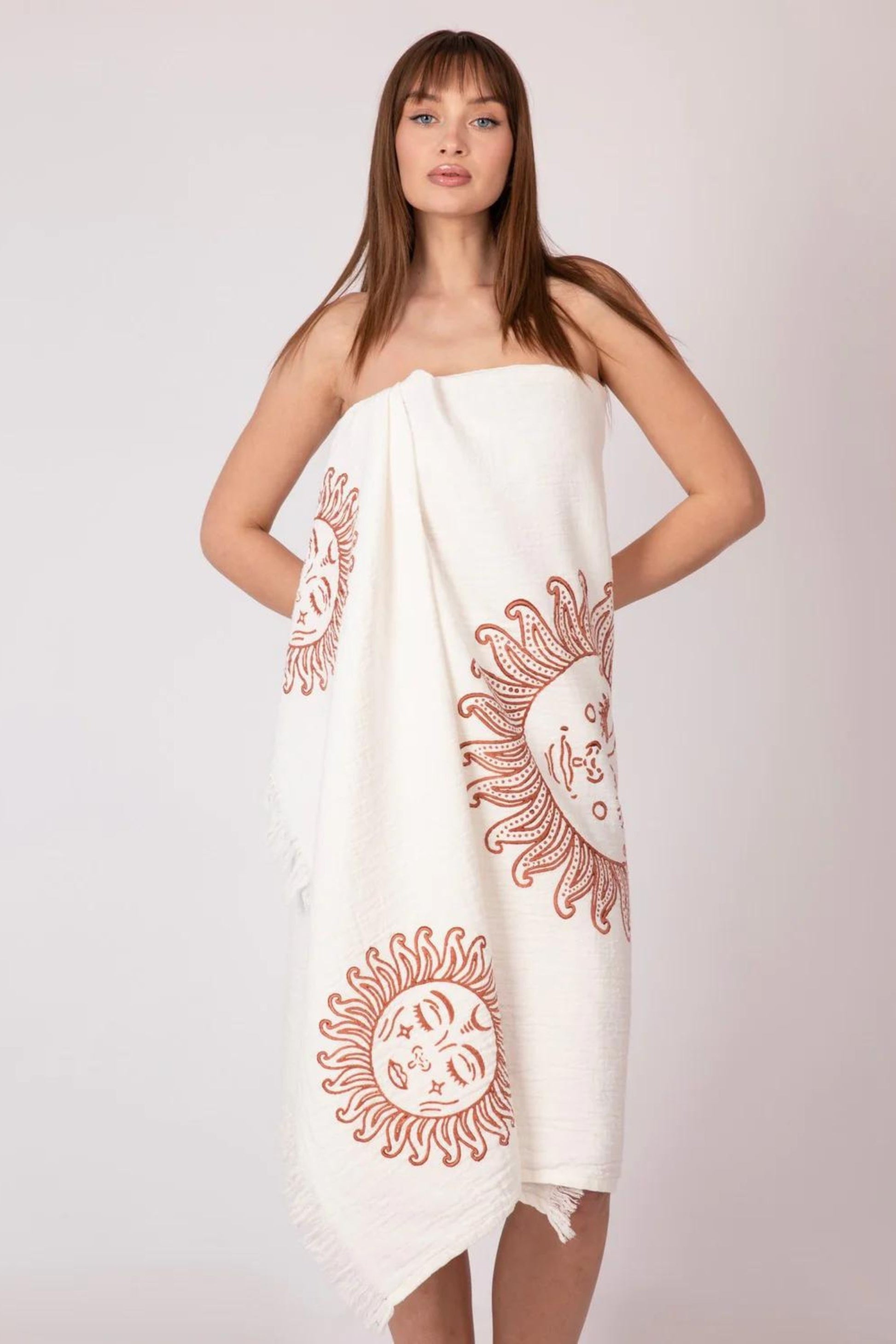 Girl in Meraki Beach OEKO-TEX certified organic cotton towel soft breathable fabric. Can be used as beach wrap and pashmina too.