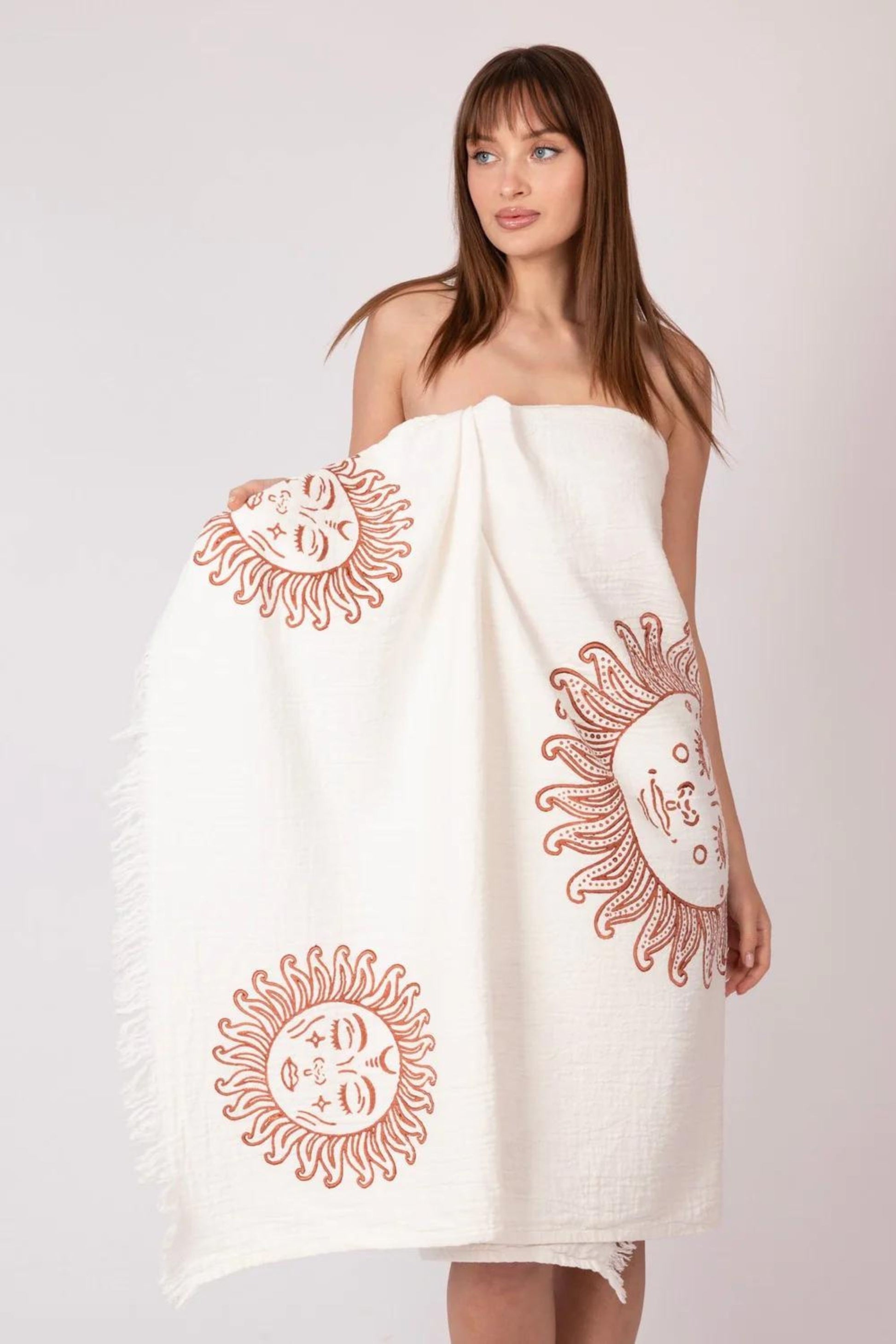 Girl in Meraki Beach OEKO-TEX certified organic cotton towel soft breathable fabric. Can be used as beach wrap and pashmina too.