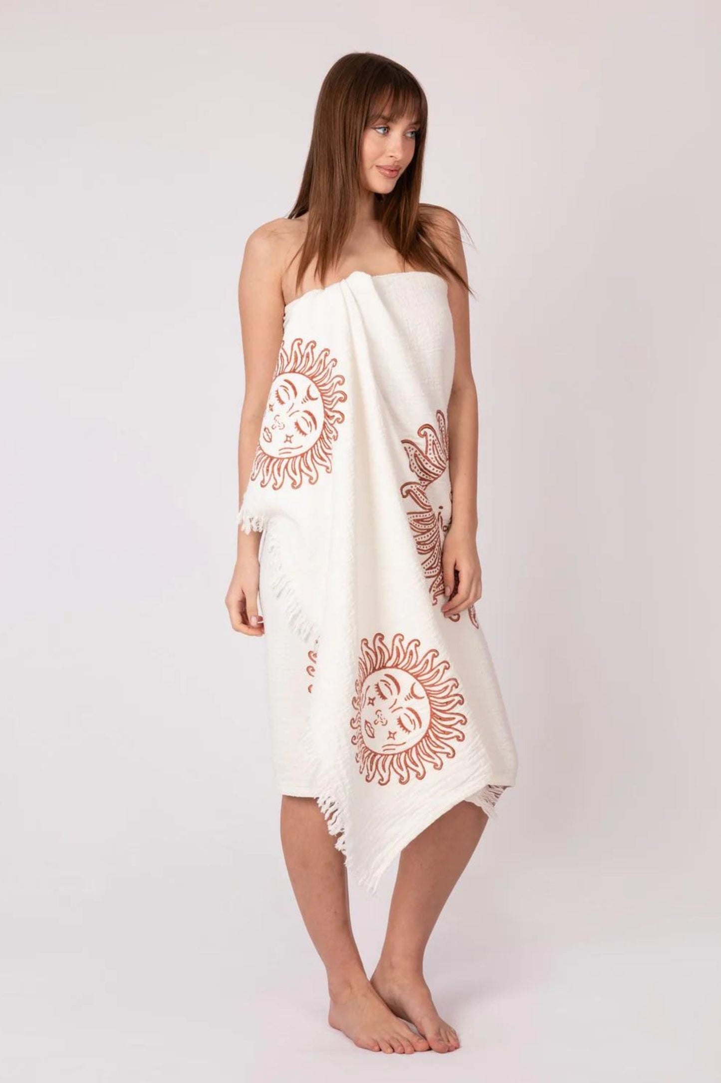 Girl in Meraki Beach OEKO-TEX certified organic cotton towel soft breathable fabric. Can be used as beach wrap and pashmina too.